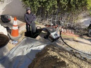technician performing hydro jetting Long Beach, CA